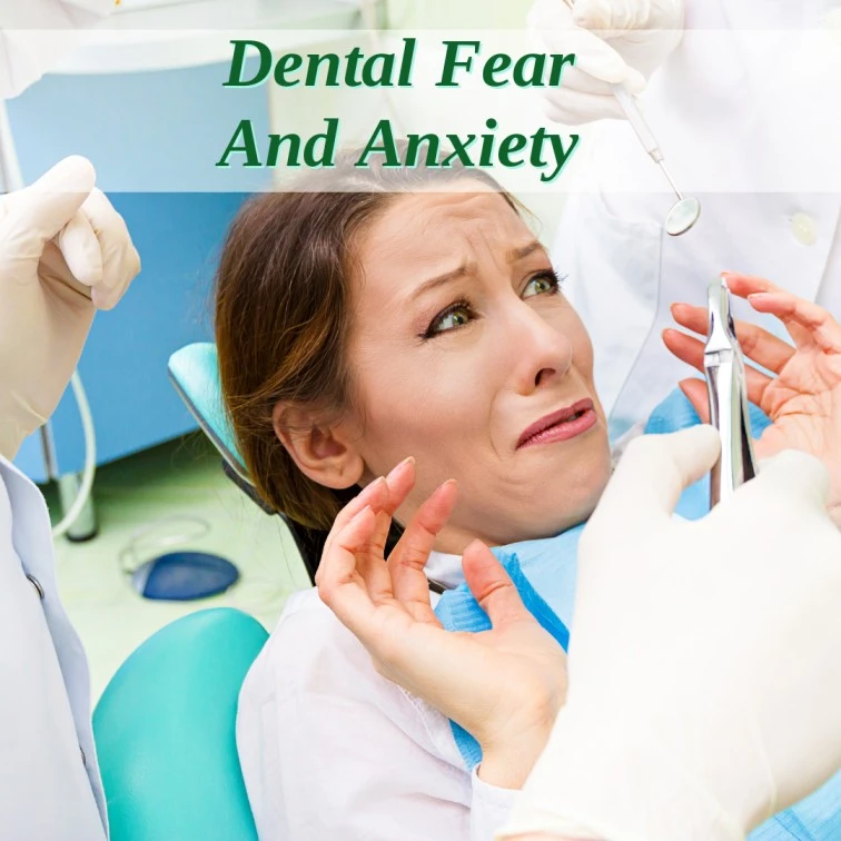 A patient sitting on a dental chair for treatment but exhibiting dental fear and anxiety.The text " dental fear and anxiety" is written with green on top